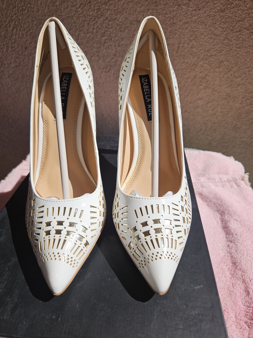Izabella Rue White Laser-Cut Pointed Toe Pumps
